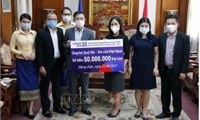 Vietnamese overseas in Laos contribute to COVID-19 vaccine fund