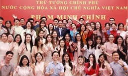 PM meets Vietnamese community in China