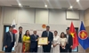 Viet Nam Fatherland Front Central Committee President Do Van Chien works with VKBIA